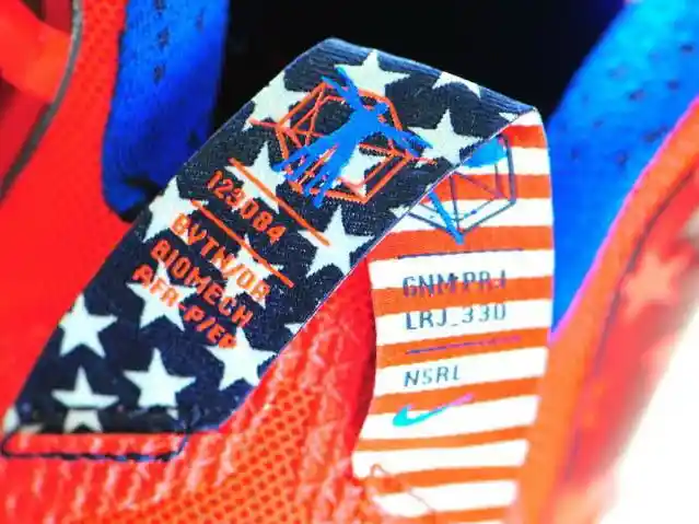 Woven pull tab label